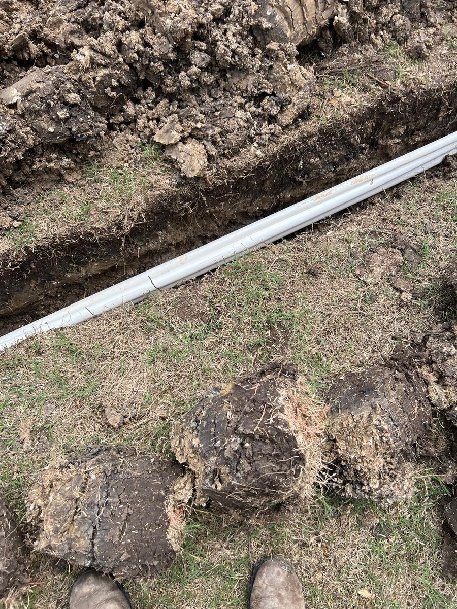 Sprinkler pipe leaking in a residential yard in Wylie TX
